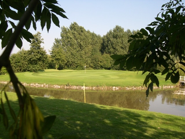 Spend a day playing Oostburg Golf Club in Holland, while staying in Bruges, Belgium