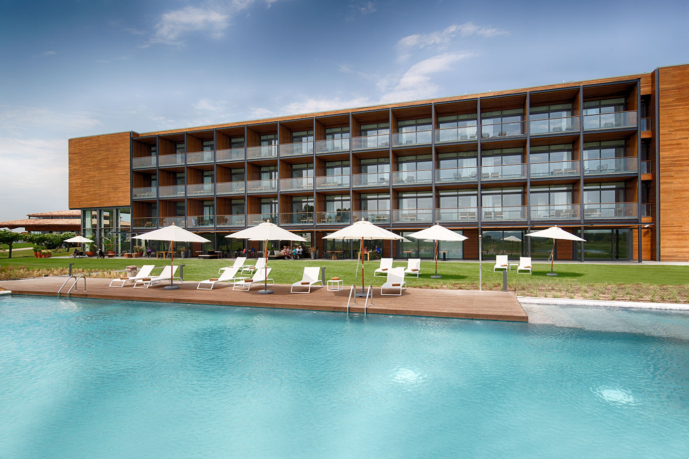 Swim in the outdoor pool at Hotel Emporda Golf Girona, Costa Brava, Spain
