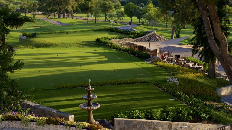 The practice green and cafe at Atalaya Golf and Country Club, Marbella, Costa del Sol, Spain. Golf Planet Holidays