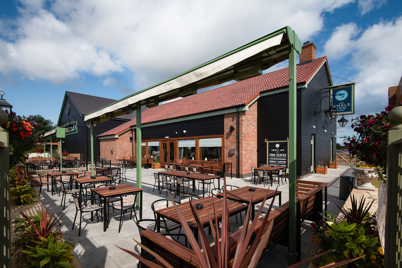 Outside on the terrace at The Amble Inn, Amble, England