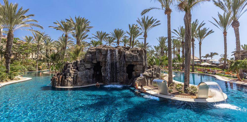 Waterfall in the middle of the swimming pool at Lopesan Costa Meloneras, Gran Canaria
