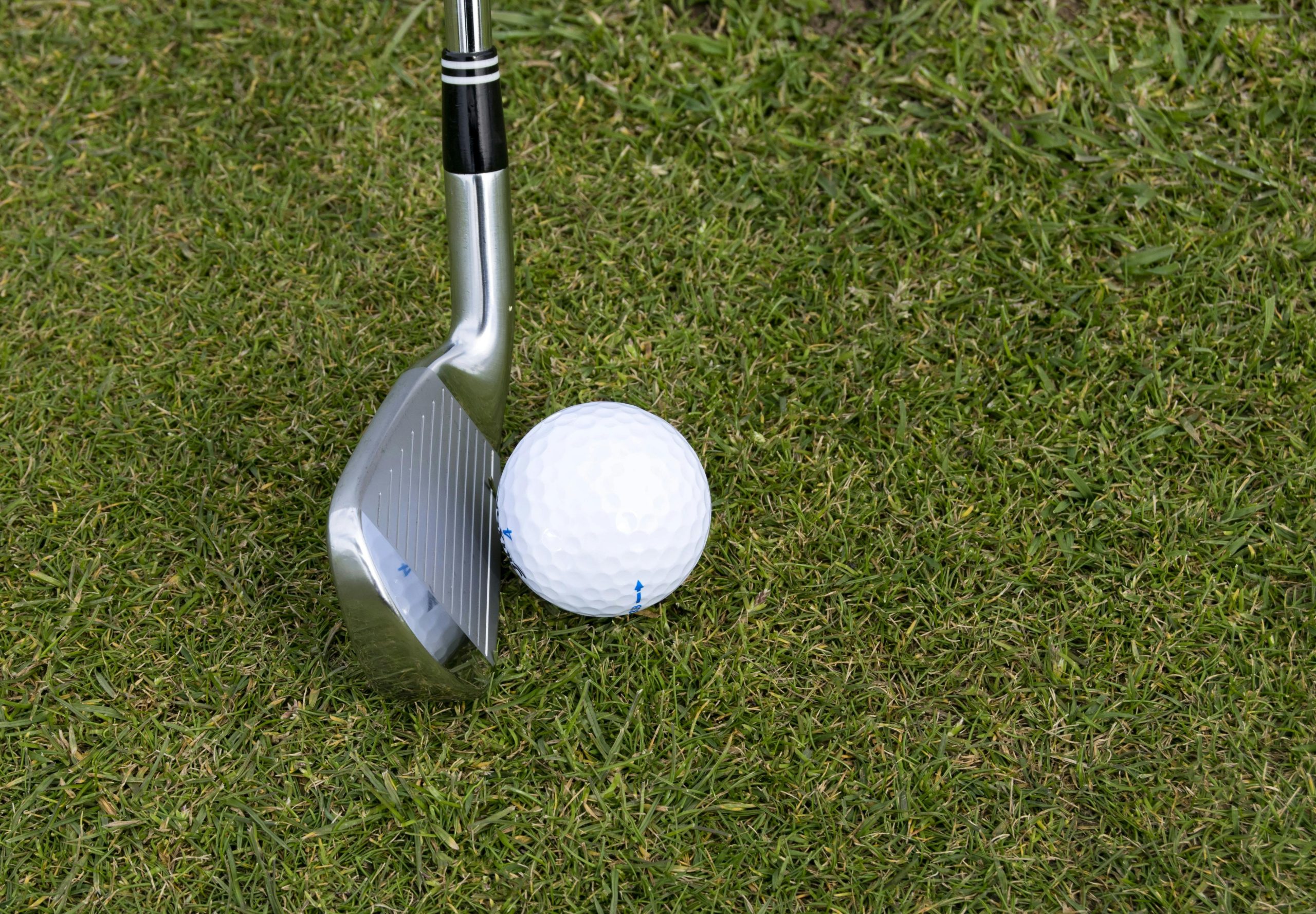 lining up club and ball. Golf Planet Holidays