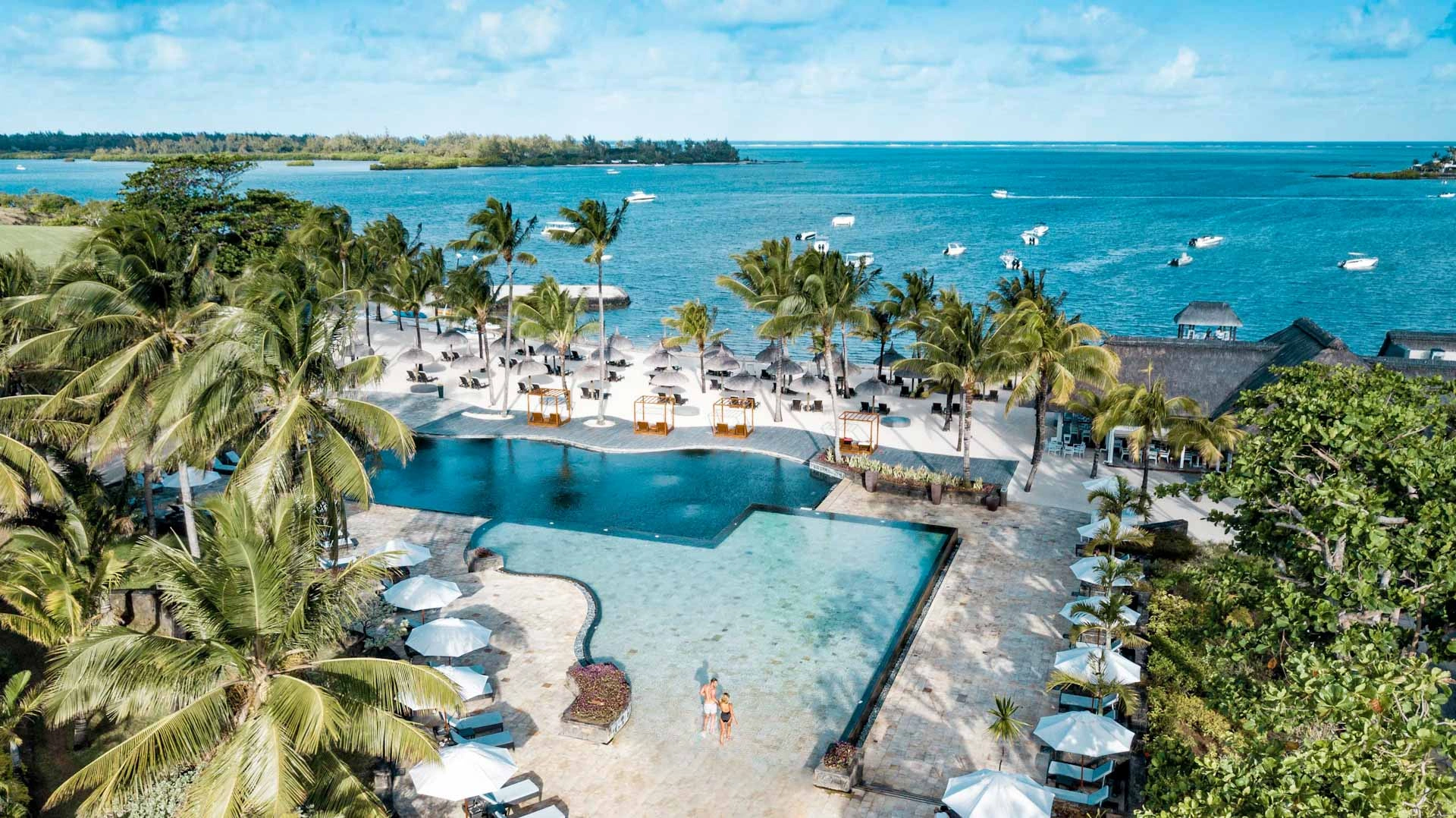 Poolside at Anahita Golf and Spa Resort, Mauritus. Golf Planet Holidays.